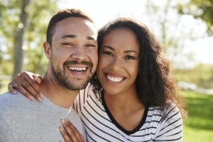 What is Gum Recession and Grafting? Mountainview Periodontics in parker, co, periodontics of cherry creek in glendale, co Dr. Maryanne Butler, Dr. Amy Riffel Outdoor Head And Shoulders Portrait Of Smiling Couple In Park