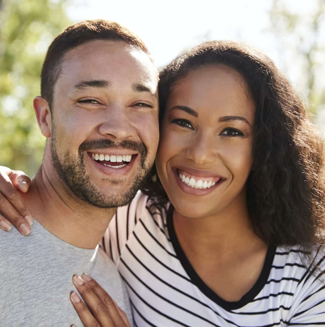 root coverage gum grafting in parker and glendale co What is Gum Recession and Grafting? Mountainview Periodontics in parker, co, periodontics of cherry creek in glendale, co Dr. Maryanne Butler, Dr. Amy Riffel Outdoor Head And Shoulders Portrait Of Smiling Couple In Park