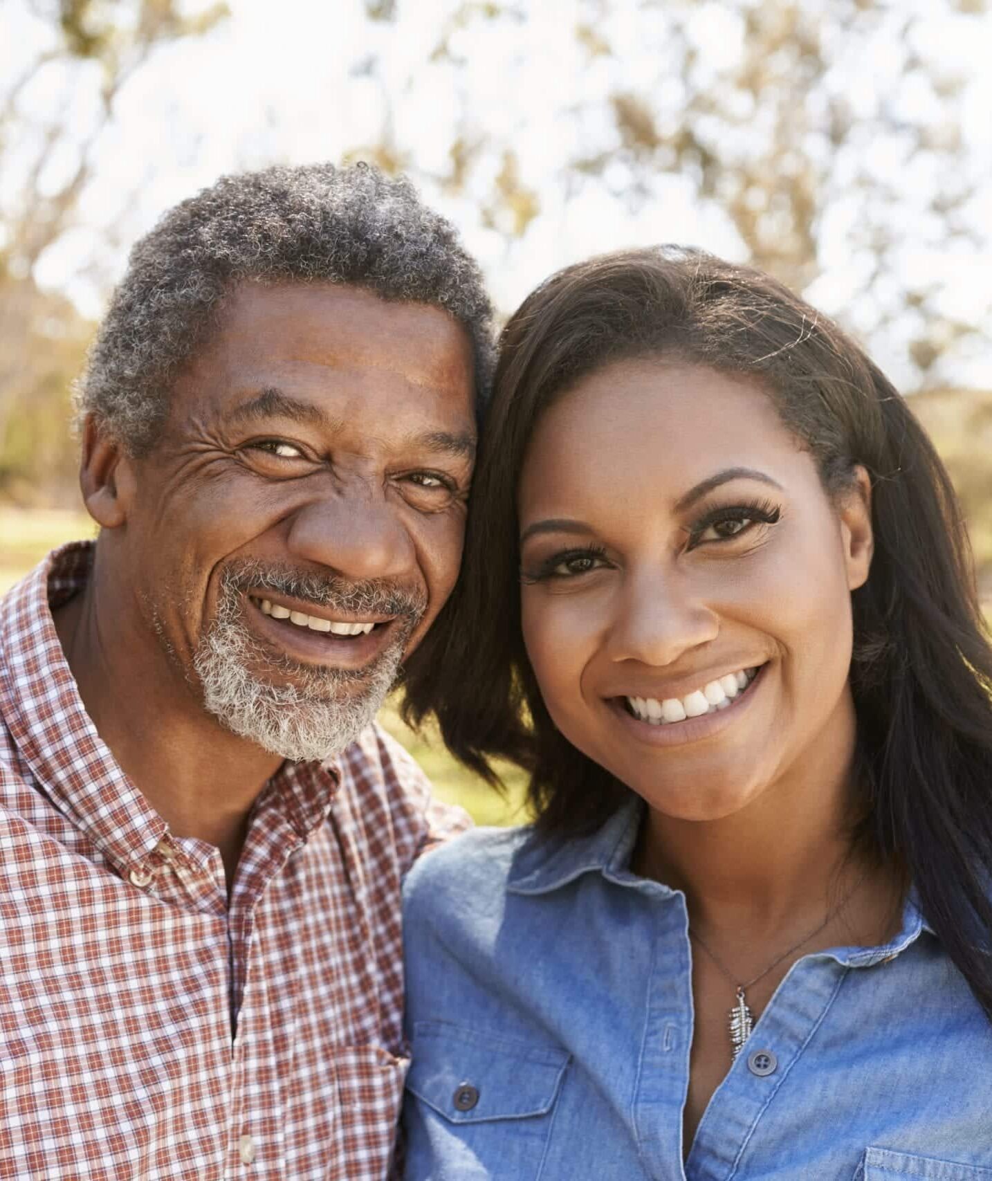 Smiling couple on the sinus augmentation information page