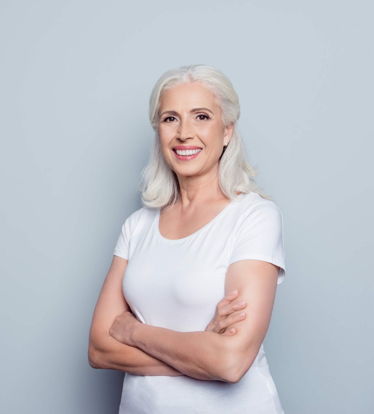 Smiling woman on the ridge augmentation information page